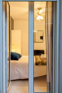 A bed or beds in a room at Habitaciones Barra89