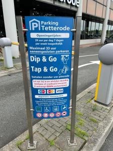 a parking meter on the side of the road at G Experience Hotel in Amsterdam