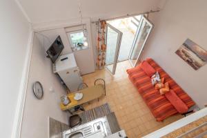 TV a/nebo společenská místnost v ubytování Apartmani Kate