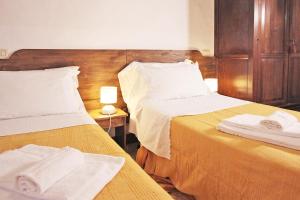 Krevet ili kreveti u jedinici u objektu Girolamo Apartment - Super Central, Private Parking & Outdoor Area