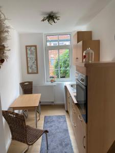 Кухня или кухненски бокс в Altstadt Fereienwohnung Hameln