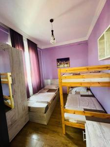 Poschodová posteľ alebo postele v izbe v ubytovaní House Magda