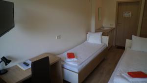 Postel nebo postele na pokoji v ubytování Bella Jūrmala Hotel