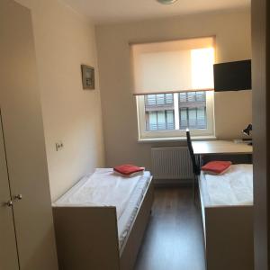 Postel nebo postele na pokoji v ubytování Bella Jūrmala Hotel