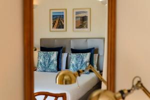 Ein Bett oder Betten in einem Zimmer der Unterkunft Blue Bamboo Hotel - Duna Parque Resorts & Hotels
