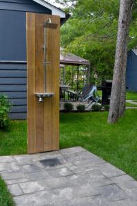 a wooden door in the middle of a yard at Adrians Wasaga Beach in Wasaga Beach