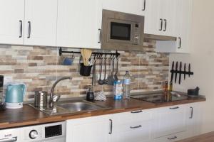 Kuchyň nebo kuchyňský kout v ubytování Apartamento Ro-Ro Valle Gran Rey