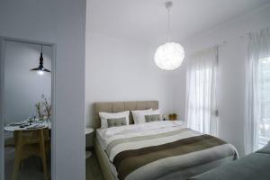 Postel nebo postele na pokoji v ubytování Luxury Central Studio