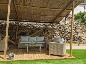 A seating area at Casa Juliana Turismo