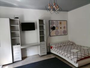 Posteľ alebo postele v izbe v ubytovaní Mérey Apartment