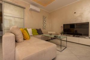 TV a/nebo společenská místnost v ubytování Apartment Rippl II