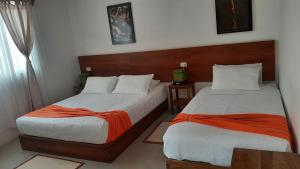 Voodi või voodid majutusasutuse HOSTAL TERO REAL toas