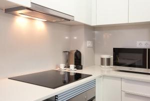 Kuchyňa alebo kuchynka v ubytovaní APBCN Eixample Center