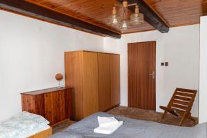 Postel nebo postele na pokoji v ubytování Apartmán ve Mlýně