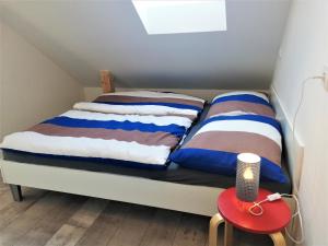 Postel nebo postele na pokoji v ubytování Apartmány Pod Čápy, Nasavrky