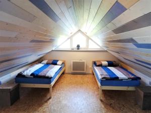 Postel nebo postele na pokoji v ubytování Apartmány Pod Čápy, Nasavrky