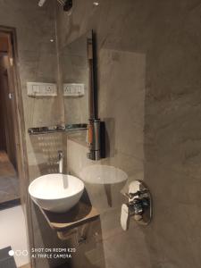 Kylpyhuone majoituspaikassa Hotel Dream Residency