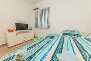 Кровать или кровати в номере Family blue apartman Montenegro