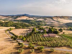 an aerial view of a farm with trees at Agriturismo Podere Il Sorbo in Campagnatico