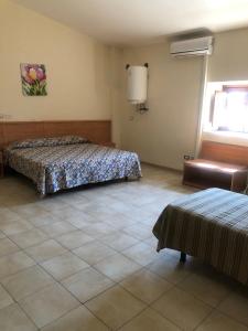 Ein Bett oder Betten in einem Zimmer der Unterkunft Hostels Euro Mediterraneo