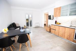 Η κουζίνα ή μικρή κουζίνα στο Raeti Apartments