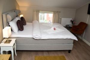 Postel nebo postele na pokoji v ubytování Appelberg hotel