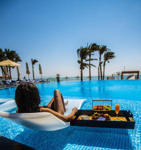 Bazén v ubytování Cancun Sokhna Resort & Villas nebo v jeho okolí