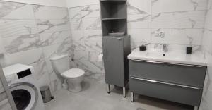 Kúpeľňa v ubytovaní Apartament Telkom 2 + 16 fotografií