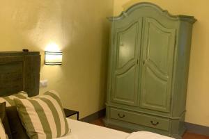 A bed or beds in a room at Azienda Agricola Maremma Bio