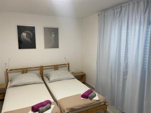 Krevet ili kreveti u jedinici u objektu Holiday Home Tranquility