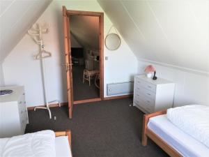 Llit o llits en una habitació de Gæstebolig,Tørresøvej 87