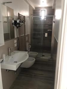 Koupelna v ubytování B&B I BRONZI