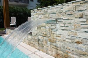 The swimming pool at or close to Residence Rivachiara (check-in at Hotel Riviera in Viale Rovereto, 95)