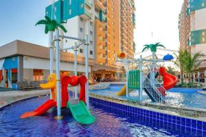 a pool with a water park with a playground at Olímpia Park Resort in Olímpia