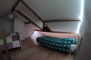 Gîte Ispagnac客房内的一张或多张床位