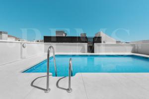 Fotografie z fotogalerie ubytování Industrial-style studio with common swimming pool - Center by REMS v Malaze