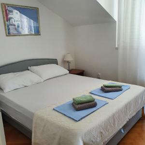 Postel nebo postele na pokoji v ubytování Apartment Kate Slatine