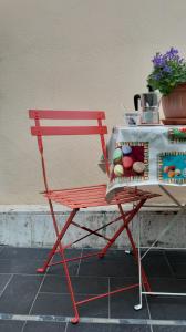 ローマにあるB&B J&Bの赤い椅子