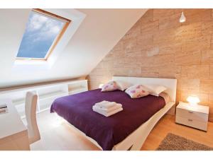 Postel nebo postele na pokoji v ubytování Laura Lux Suites