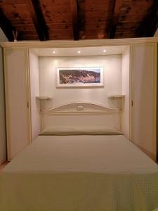 Postel nebo postele na pokoji v ubytování B&B Terra Di Liguria