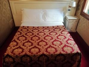 A bed or beds in a room at CASA MARGOT