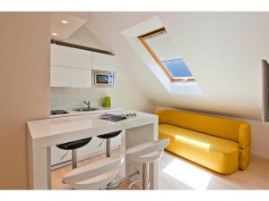 Kuchyň nebo kuchyňský kout v ubytování Laura Lux Suites