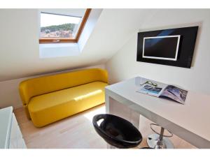 TV a/nebo společenská místnost v ubytování Laura Lux Suites