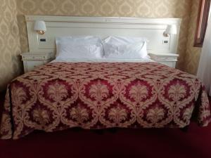 A bed or beds in a room at CASA MARGOT