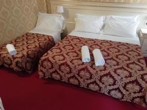 A bed or beds in a room at CASA MARGOT