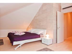 Postel nebo postele na pokoji v ubytování Laura Lux Suites