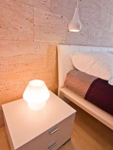 Postel nebo postele na pokoji v ubytování Laura Lux Suites