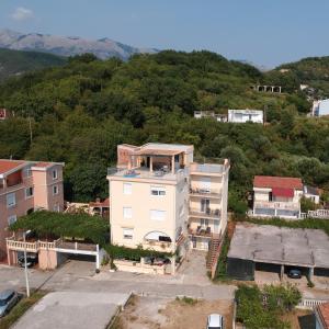 an aerial view of a building in a city at Montenegrina Apartment in Budva