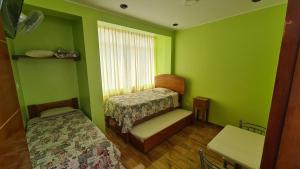 Katil atau katil-katil dalam bilik di Hospedaje Lunita