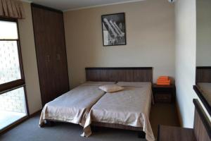 Posteľ alebo postele v izbe v ubytovaní Dergachov Guest House